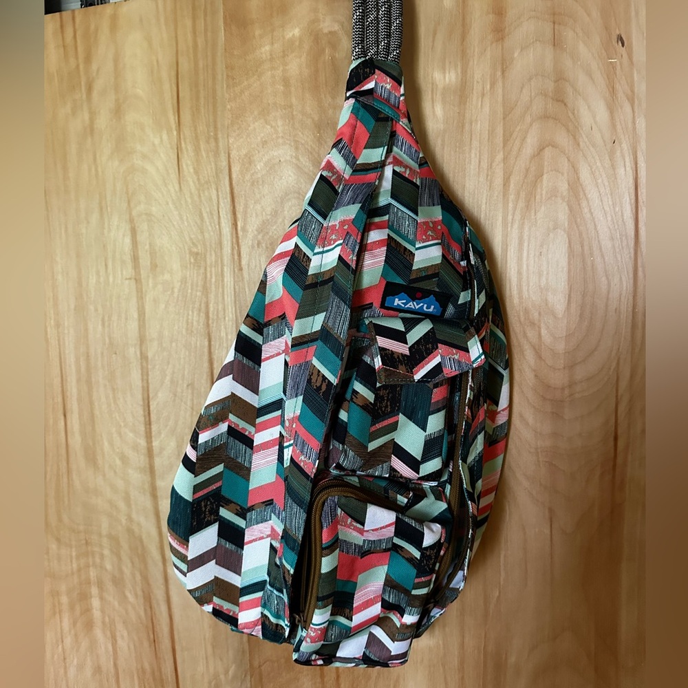 Kavu Chevron Pattern Crossbody Sling Bag in Teal, Coral, White, Brown. Larger s